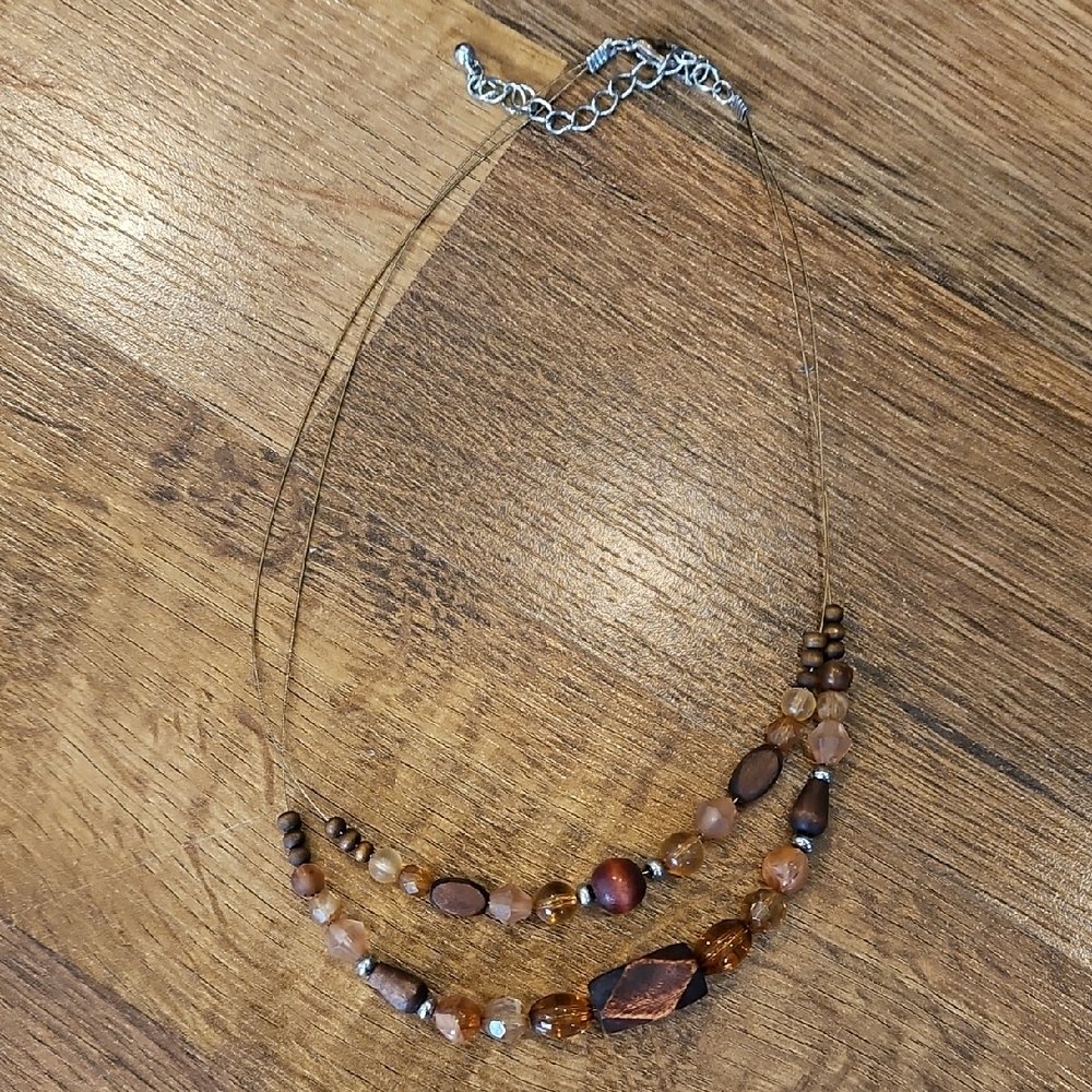 Necklace with assorted shades of brown beads